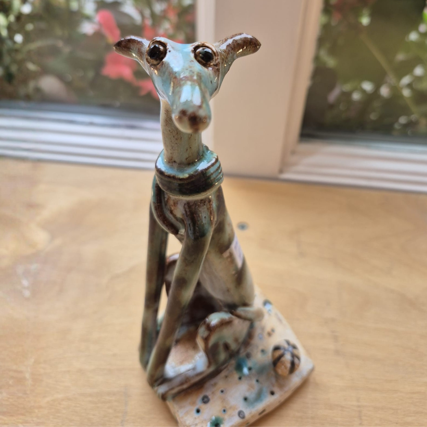 Shelagh Spear Sitting Brown Dog and Ball SS248
