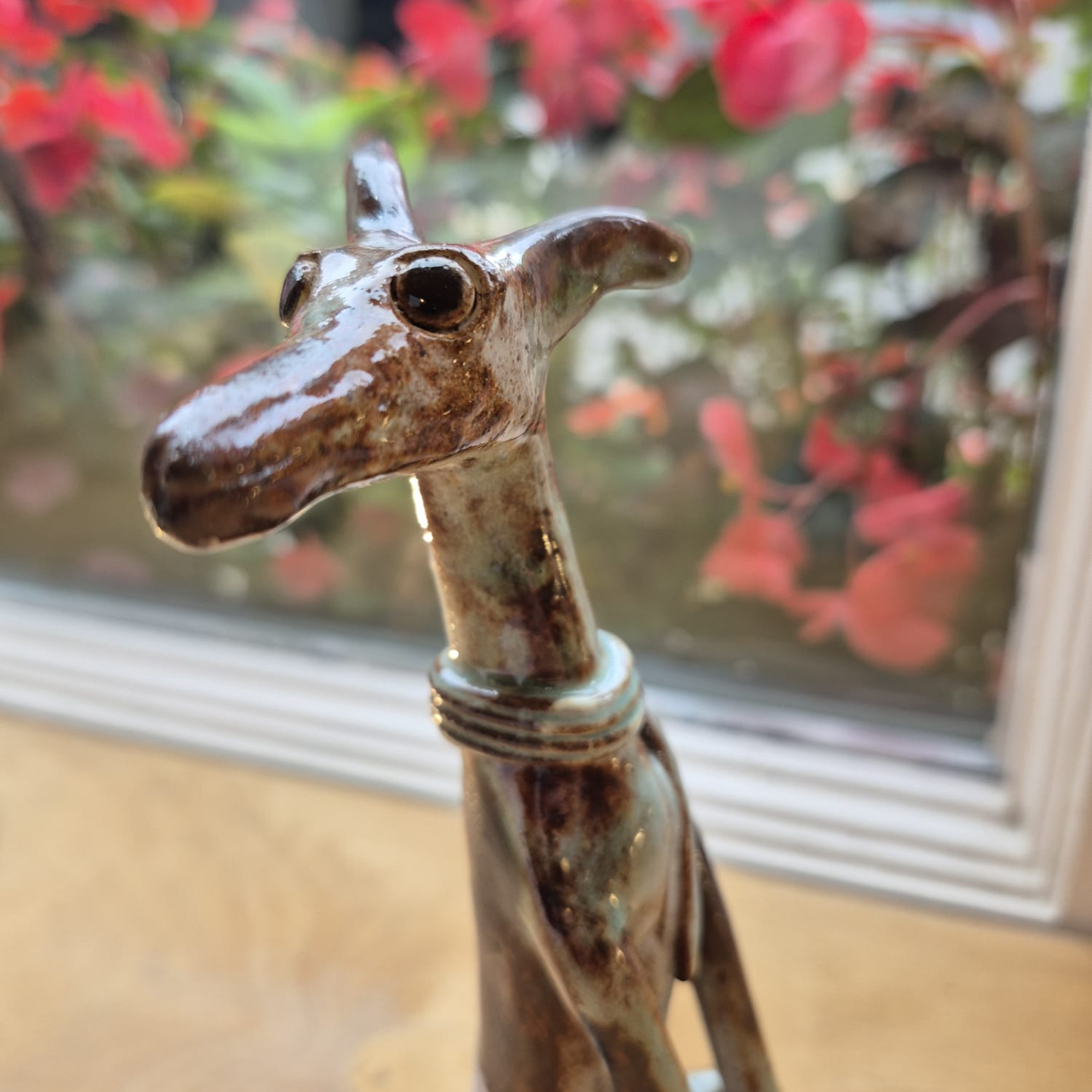 Shelagh Spear Sitting Brown Dog and Ball SS247
