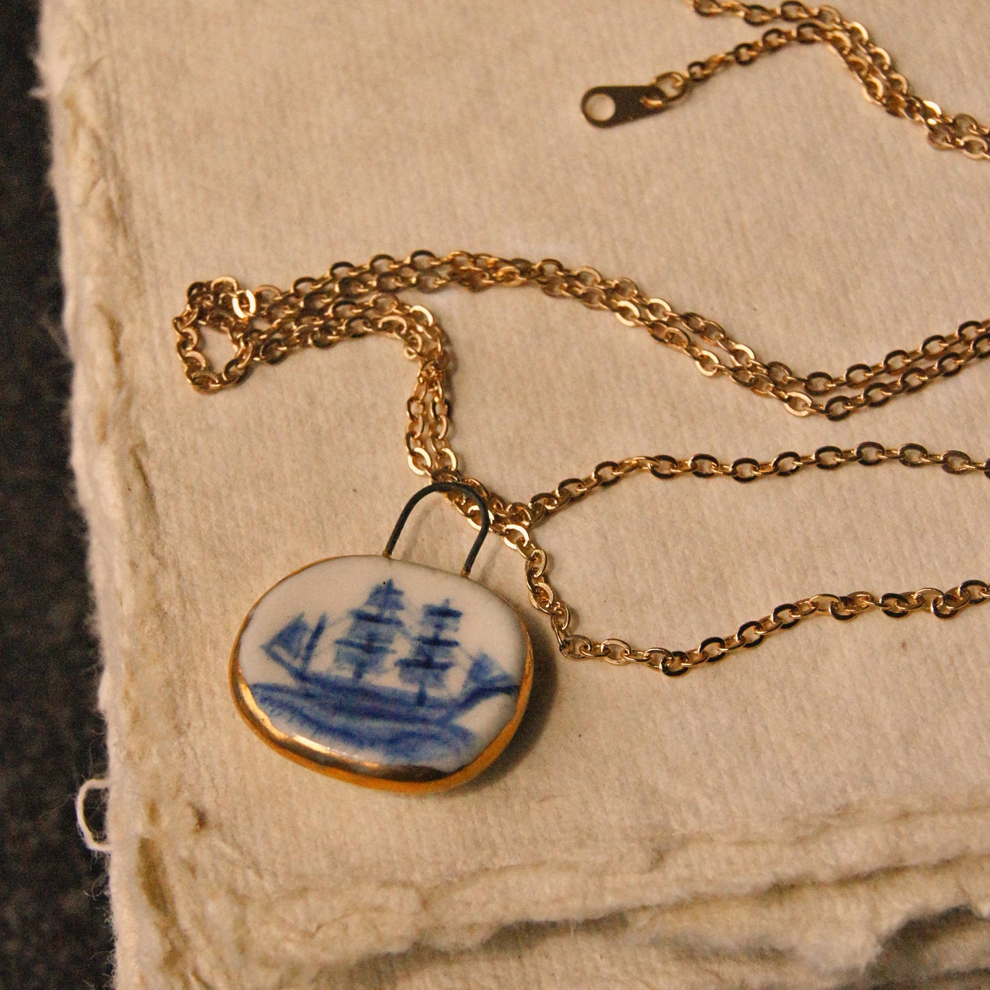 Porcelain Pendant with Gold Lustre - Ship