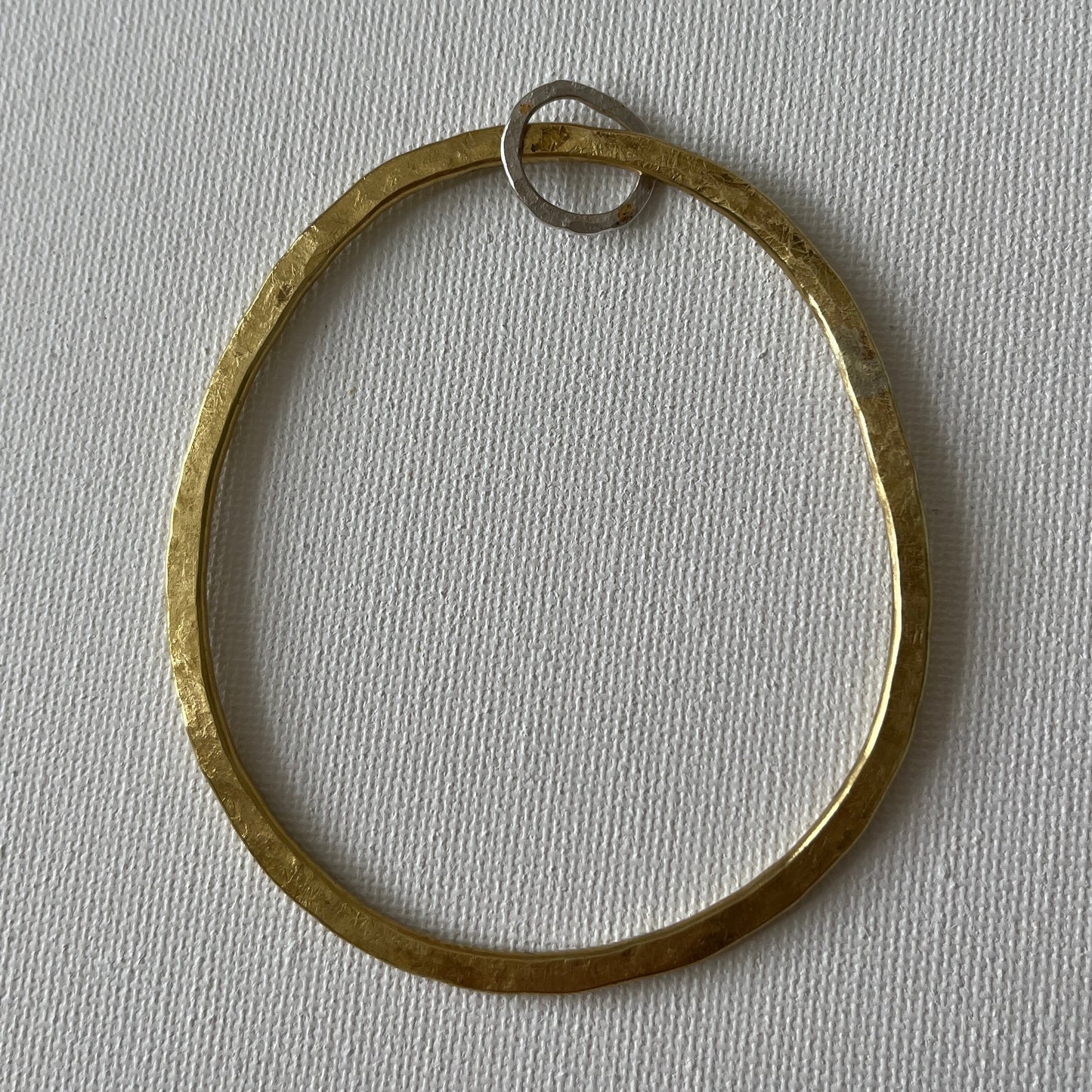 Hammered Brass Bangle with Oval Eco-Silver Charm