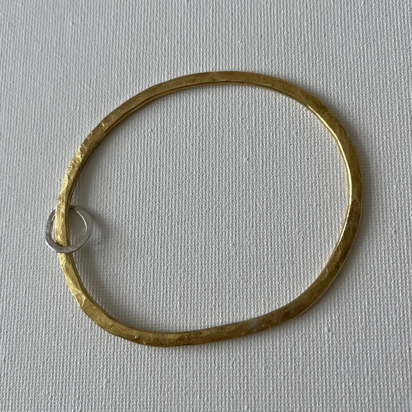 Hammered Brass Bangle with Oval Eco-Silver Charm