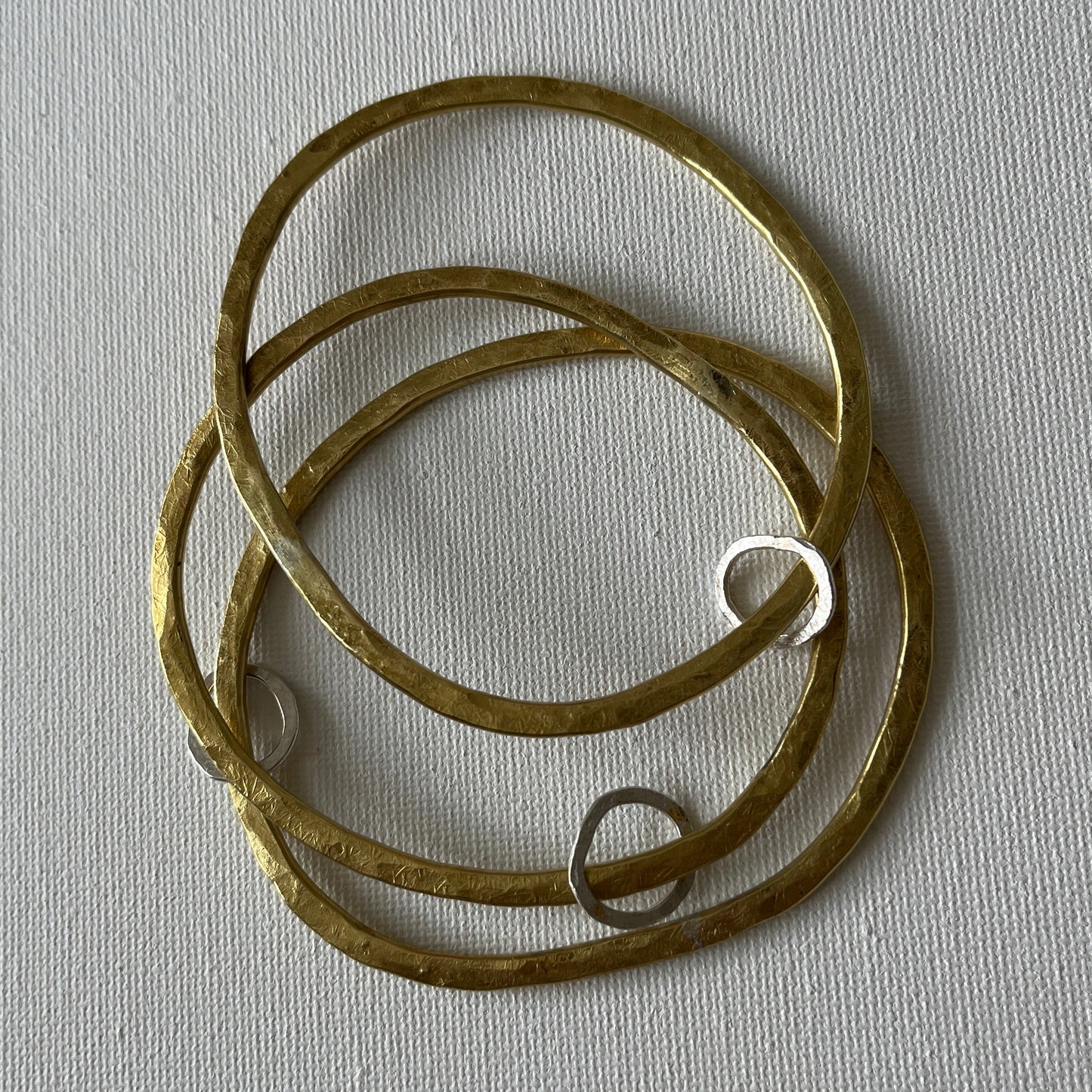 Hammered Brass Bangle with Oval Eco-Silver Charm