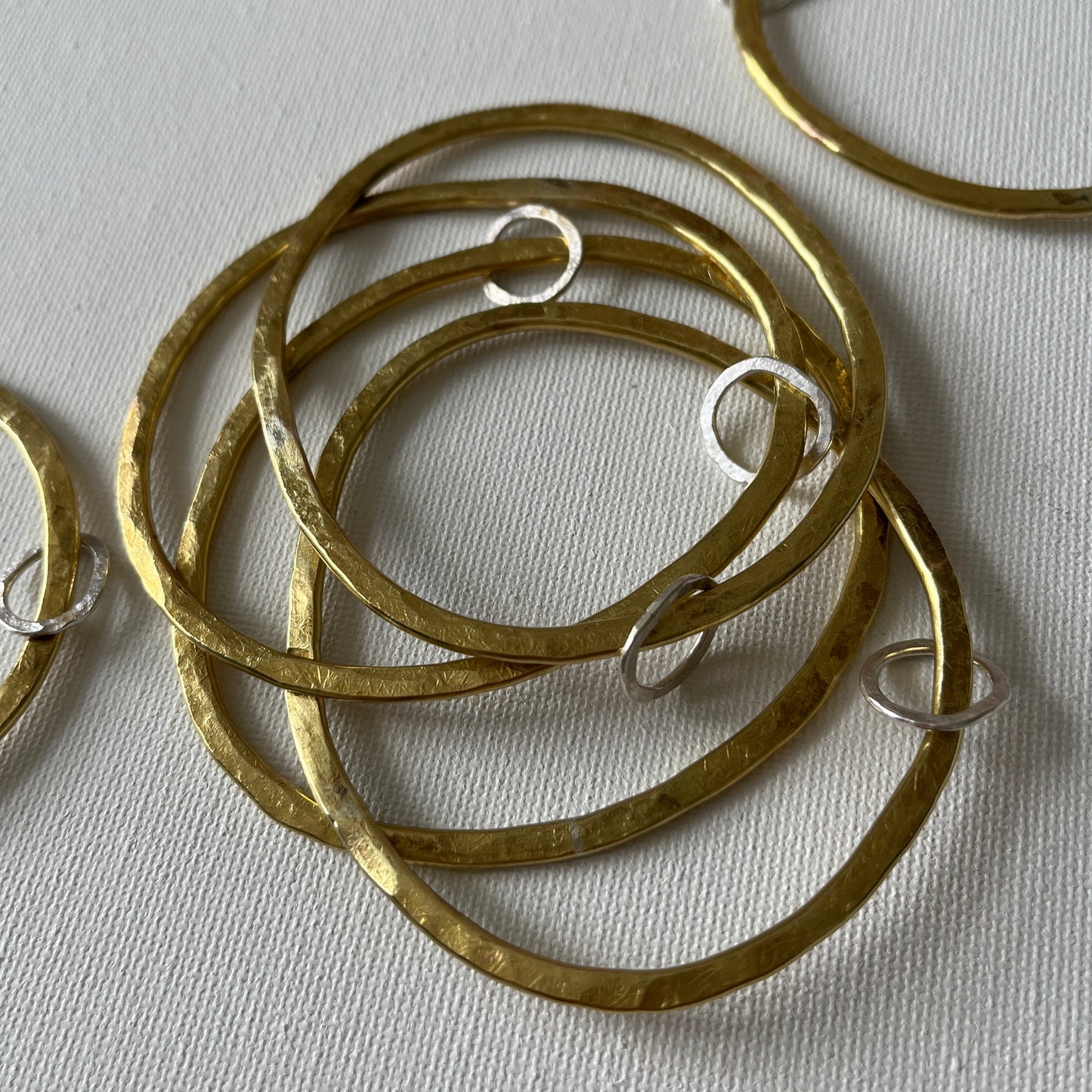 Hammered Brass Bangle with Oval Eco-Silver Charm
