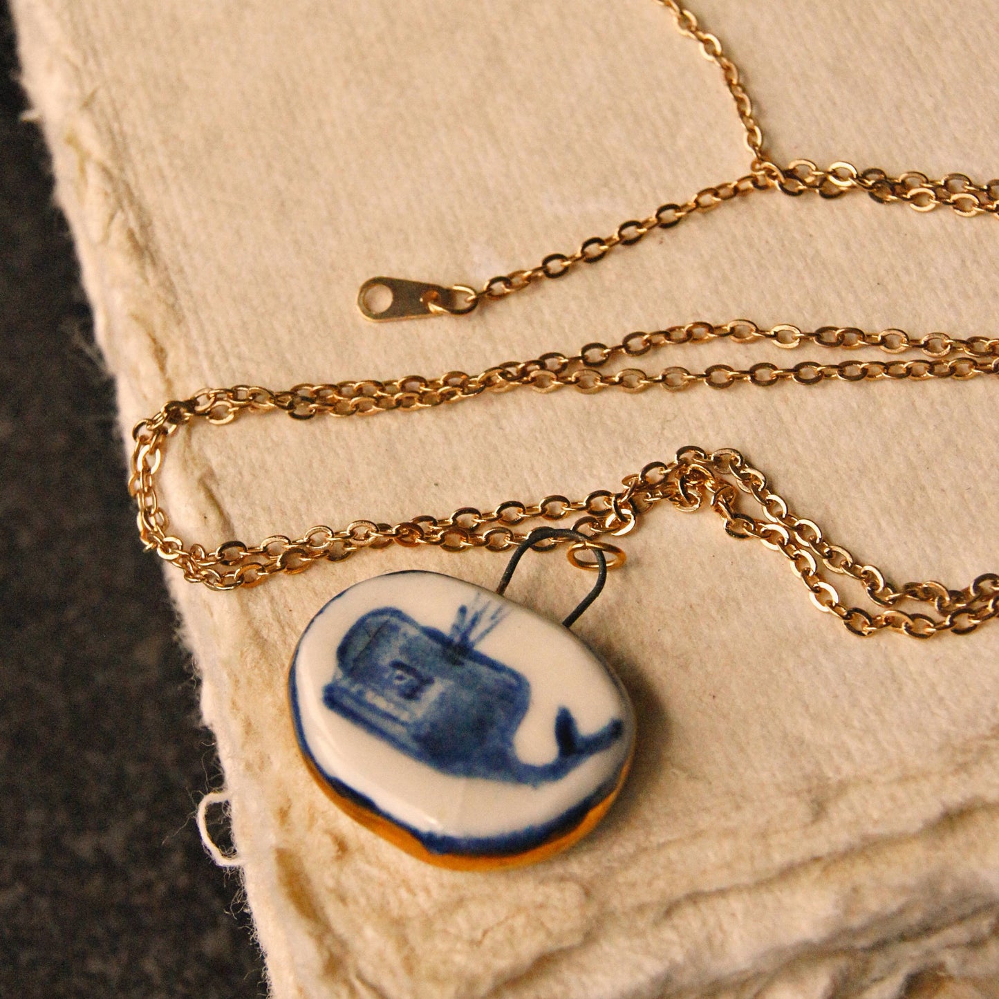 Porcelain Pendant with Gold Lustre - Whale
